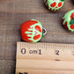 Red and White Poisoned Apple Charm